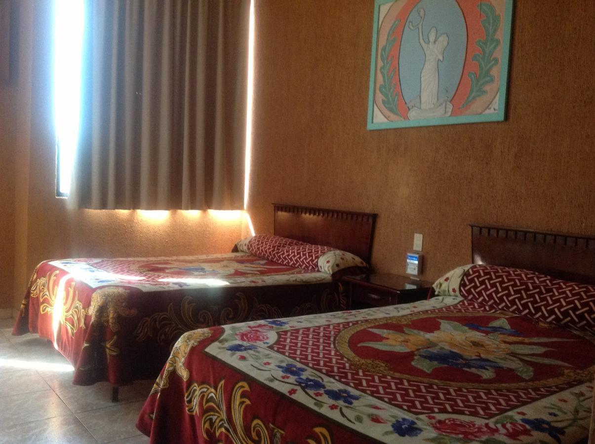 Hotel Colombo San Juan de los Lagos Habitación foto